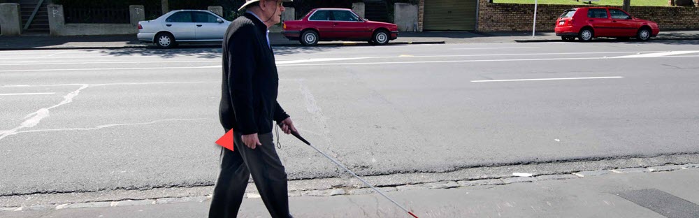 I am losing sight. Photo of person that needed to know what do to when vision starting changing. Now he walks down the street with the help of a cane.